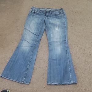 Distressed blue jeans